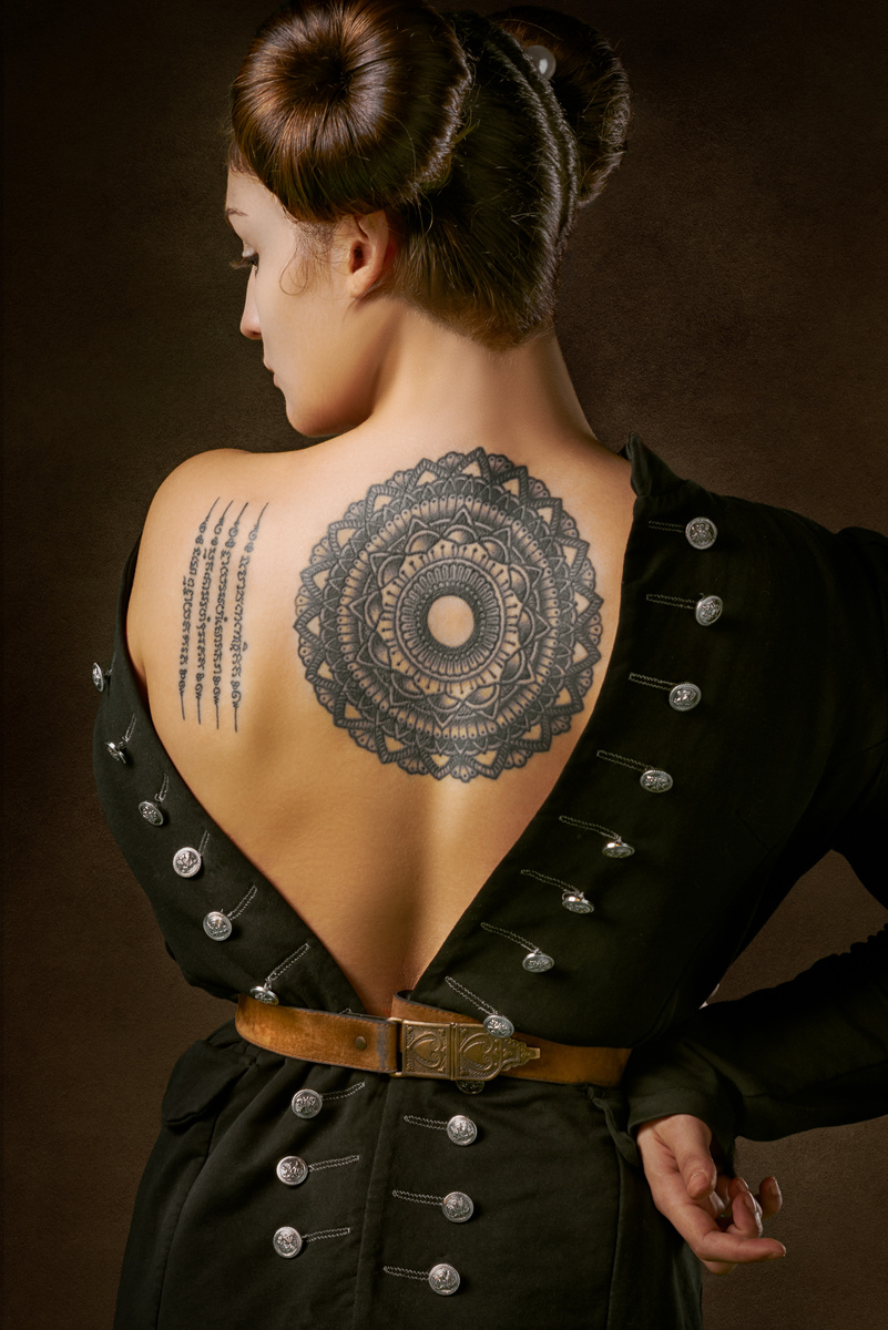 Woman with Back Tattoo